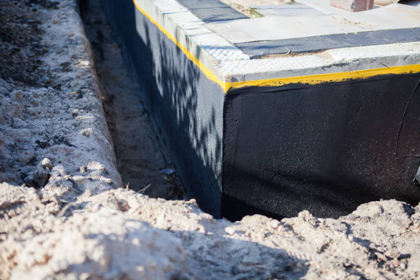 Professional Emergency Waterproofing technician working in Whitewater, KS